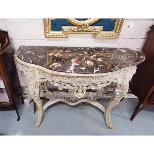 178 - Ornately Carved Consol Table with pierced floral fretwork, light cream coloured, with a serpentine s... 