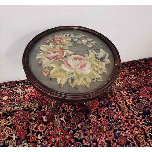 182 - Late Victorian low-sized circular occasional table, with ornate floral needlepoint top, on 3 scrolle... 