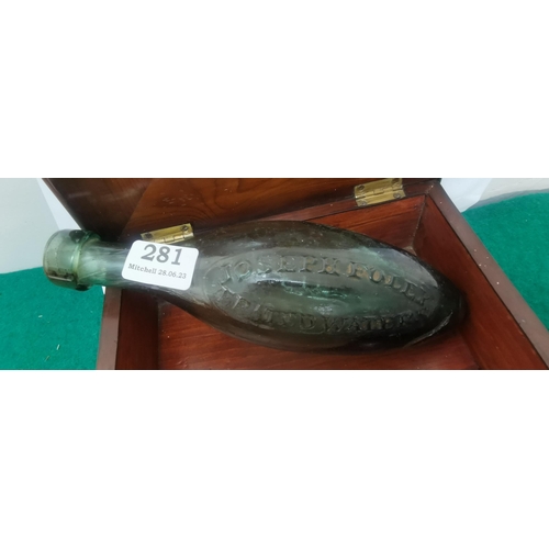 281 - Old green oval-shaped bottle, impressed 