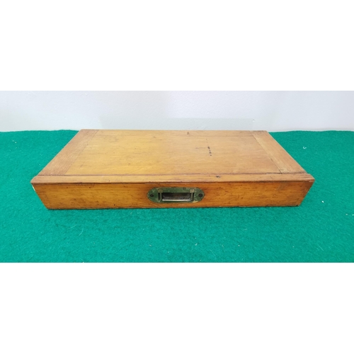 299 - Folding oak writing slope, with a tooled green top, 36cm sq