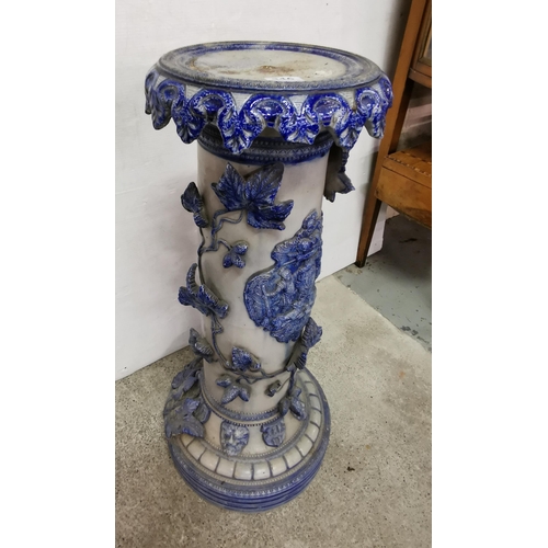 346 - German blue glazed porcelain Jardinere Stand, decorated with a coat of arms and raised vine leaves, ... 