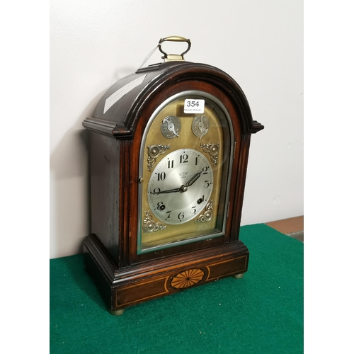 354 - Double Striking Mantle Clock, in a good mahogany case, the dial stamped Yiweco, on brass toes, brass... 