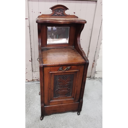 398 - Walnut Fuel Box, with carvings of a bowl of flowers on the pivoting door, mirrored gallery shelf, 40... 