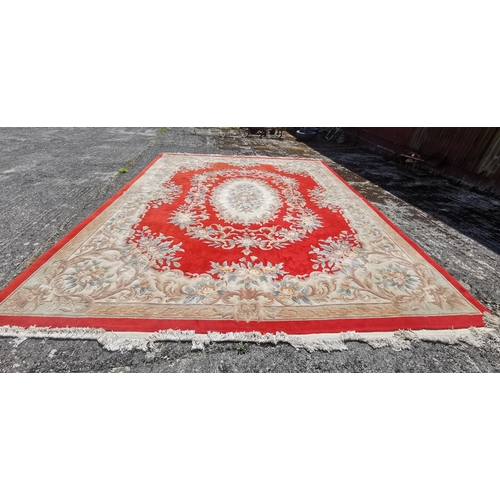 400 - Large Chinese Wool Floor Rug, red ground with central cream and blue/light green floral medallion, 3... 