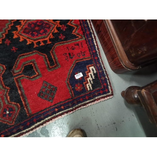 402 - Handwoven Persian Nahvan Village Rug, unique medallion design piece, red ground, signed 2.53 x 1m