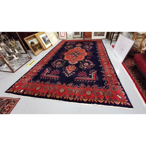 413 - Persian Rug, rich blue ground Sorok design, unique red, green medallion design with a red border, 2m... 