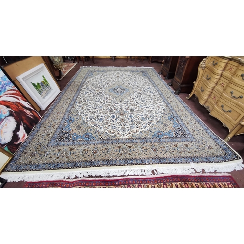 417 - Large full pile wool blue and ivory ground Iranian carpet, traditional floral pattern, 3.3m x 2.4m