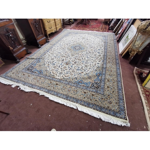 417 - Large full pile wool blue and ivory ground Iranian carpet, traditional floral pattern, 3.3m x 2.4m