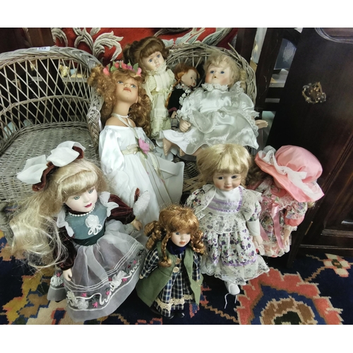 459 - 8 Porcelain Dolls, various colourful dresses (all dolls are from a film set)