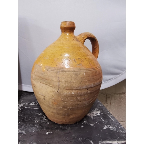 477 - Old terracotta Water Jug, bulbous shaped body, 30cmH