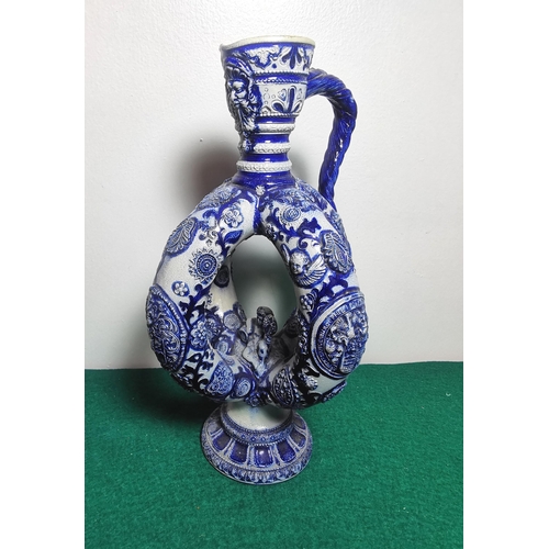 495 - Tall German blue glazed Jug, unusual twisted shape, size