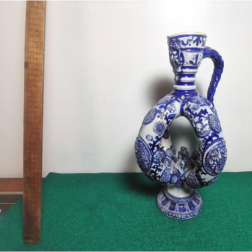 495 - Tall German blue glazed Jug, unusual twisted shape, size