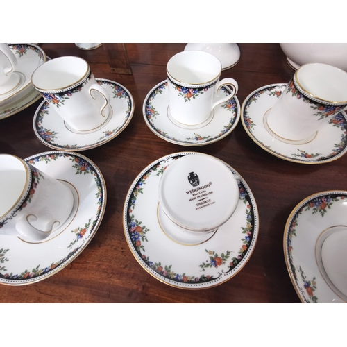 496 - Wedgewood Bone China, Tea and Coffee service, six placement settings, thirty five pieces in all, gol... 