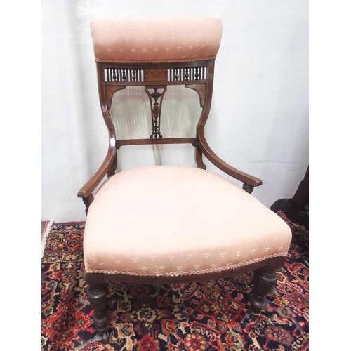 5 - Edw. low mahogany inlaid Nursing Chair, peach covered padded headrest and seat, curved legs, castors