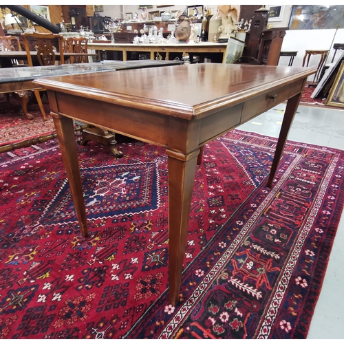 78 - Italian Writing Table by LOrigine, on tapered legs, with a central drawer, 1.25m x 69cmD