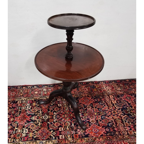 87 - 2-Tier circular Mahogany Dumbwaiter on a tripod base, with pad feet, 100cmH x 58cm dia