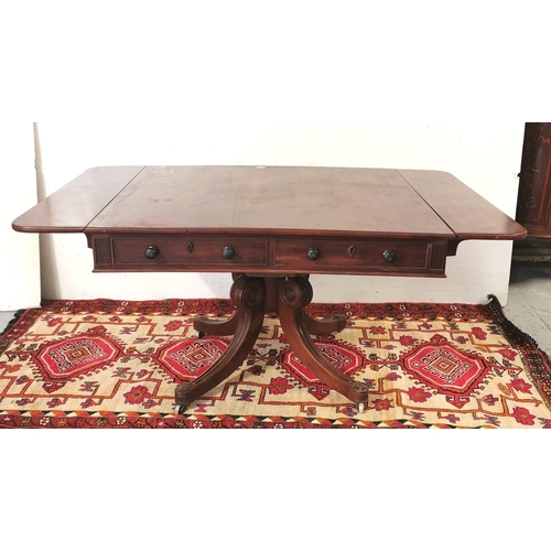 91 - WmIV large mahogany sofa table with drop side leaves, one faux drawer and one pull out drawer on eit... 