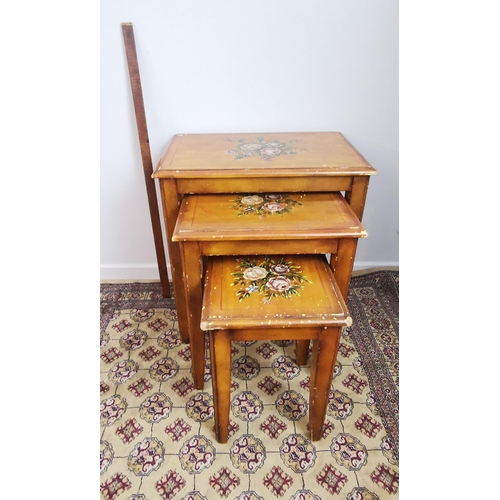 93 - Nest of 3 modern tables, floral decoration, tapered legs (yellow paint damage), 60cm widest