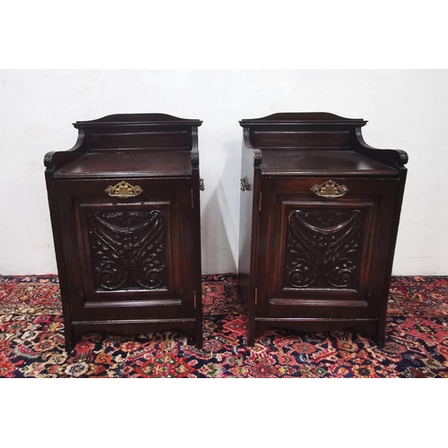 97 - Matching Pair of carved Walnut Bedside Cabinets, with 2 brass carrying handles and a similar handle ... 