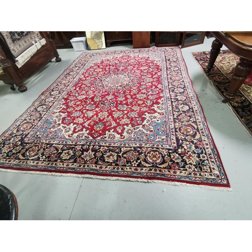 407 - Persian blue and red ground Najafabad Carpet of Isfahan region of Iran, fine woven, 3.55m x 2.52m