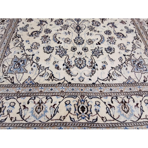 422 - Beautiful Persian Wool Floor Rug, cream ground with light blue and brown designs, size 2.9m x 1.96m