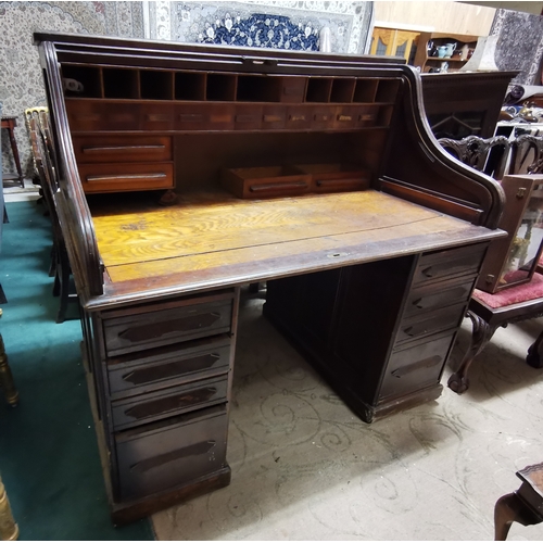 386 - Oak Dickens Style Roll Top Desk, with interior compartments and drawers on either side, panelled sid... 