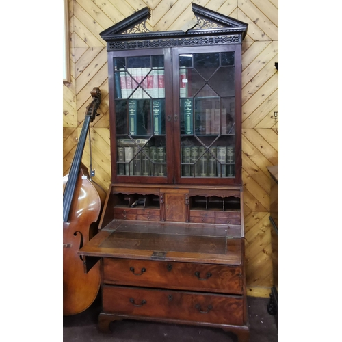 148 - Fine 19thC Mahogany Bureau Bookcase, the swan neck pediment over two glazed doors enclosing adjustab... 