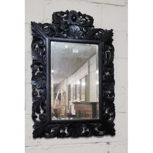 194 - Antique Wall Mirror, in a carved oak frame, 100cm x 66cm