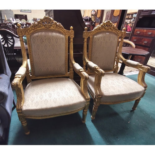 35 - Pair carved gilt framed large Armchairs, grey and gold colour fabric, reeded front legs  (1 back leg... 