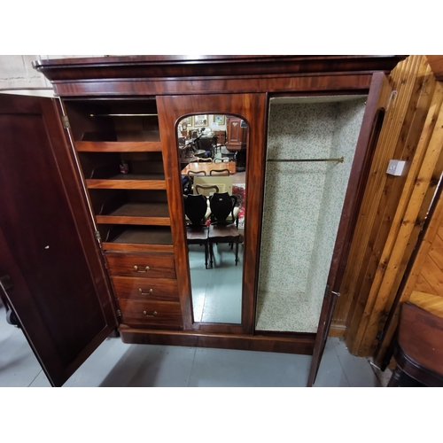 388 - Large Victorian Mahogany Wardrobe comprising of three doors (1 fitted with a mirror) - includes two ... 