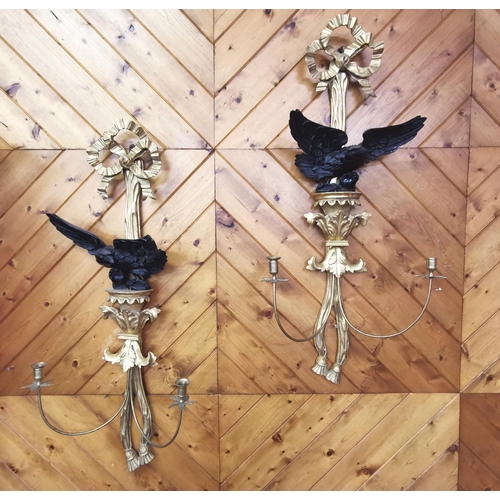 337 - Matching Pair of Carved Timber Wall Lights, gilded, the ribbon design frames mounted with perched eb... 