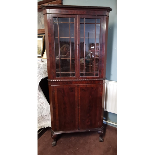 608 - Mahogany Corner Cabinet with 2 glazed doors over 2 flame mahogany cabinets below, ribbed feet, 1960'... 