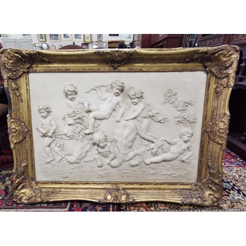 516 - Large composite Wall Picture  Cherubs on a Lion, in a decorative gold frame