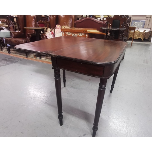 482 - Mahogany Tea Table, fold-over style, on turned front and back legs (the front panel is pine and is s... 