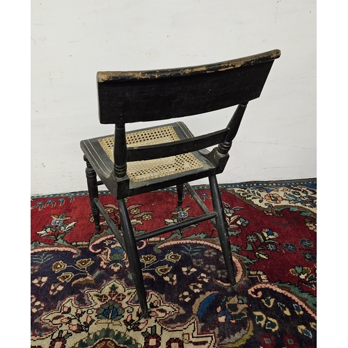 12 - Ebony painted bergere seated Chair, on turned legs, decorated with a landscape scene