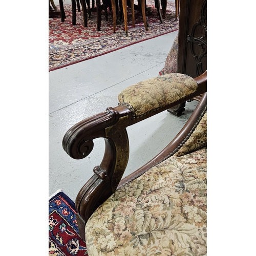 17 - WMIV Mahogany Library Armchair, on turned front legs, castors, later floral fabric (1 arm repaired i... 