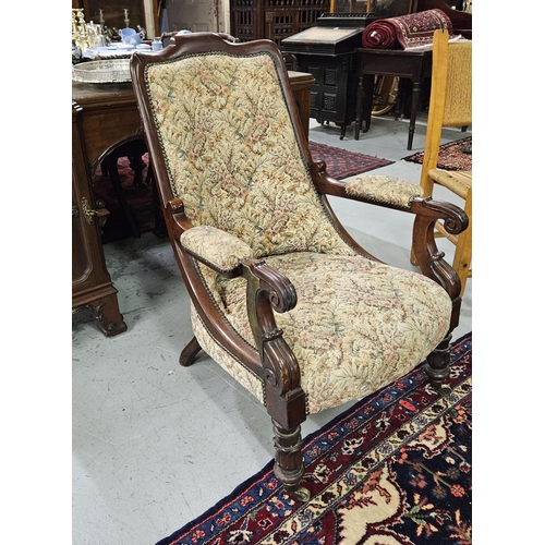 17 - WMIV Mahogany Library Armchair, on turned front legs, castors, later floral fabric (1 arm repaired i... 