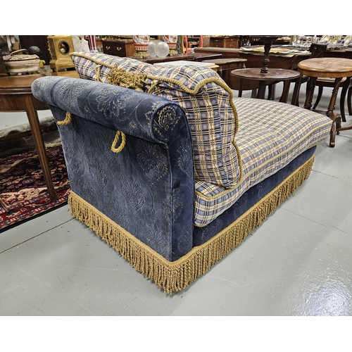 26 - Upholstered Day Bed - a navy and gold velvet fabric covered frame, with a long feather cushioned sea... 