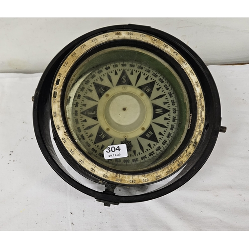 304 - Ships Gimble, in a black bakelite frame, stamped NP1216, 31cm outer diameter