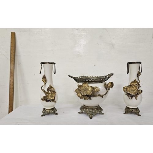 337 - 3 piece glazed floral Set incl. a pair of Vases with brass rings (29cmH) and a plant pot, with raise... 