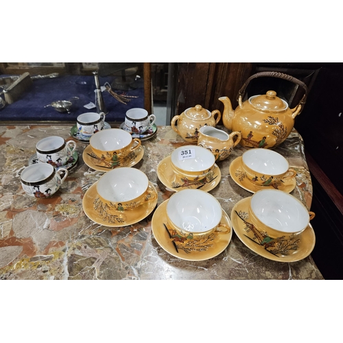 351 - Japanese eggshell 6-place setting Tea Set including a teapot, gold pattern (translucent images of a ... 