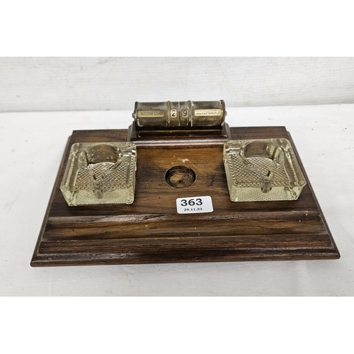 363 - Early 20thC Oak Desk Set incl. 2 glass inkwells and a brass framed adjustable calendar, 31cmW x 15cm... 