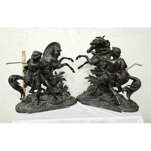 373 - Matching Pair of large spelter Marly Models, early 20thC, rearing horses with attendants, each 60cmH... 