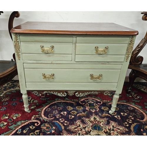 64 - Low sized Chest of two Drawers, painted green, with brass handles, a walnut top, on turned legs, cas... 