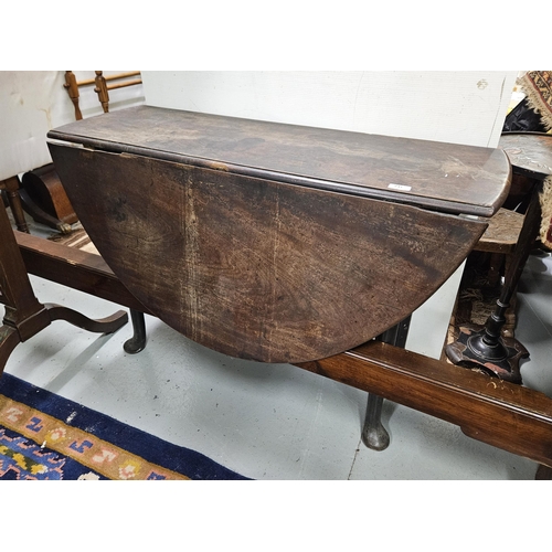 76 - Antique mahogany Drop Leaf Table with oval ends, on pad feet, 105cmW (extends to 125cm) (worn)