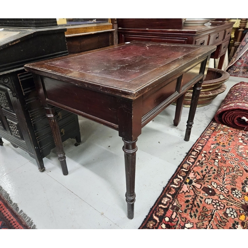 78 - Low mahogany Writing Table on turned and reeded legs, dark red leather top (worn) 70cmH x 90cmW