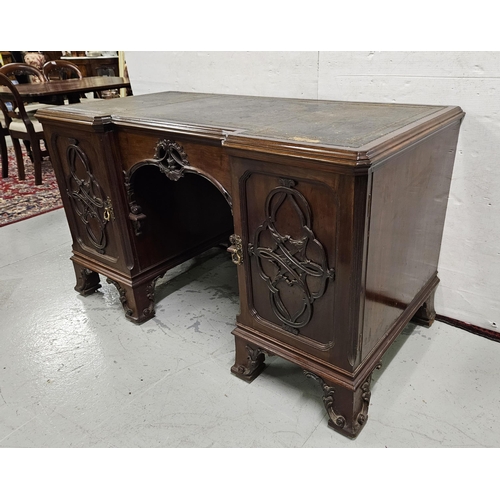 85 - 19thC Kneehole Mahogany Desk, with decoratively carved frieze and a green tooled leather top, cabine... 