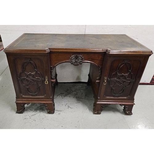 85 - 19thC Kneehole Mahogany Desk, with decoratively carved frieze and a green tooled leather top, cabine... 