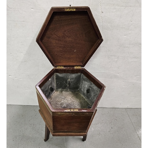 87 - Georgian Mahogany Wine Cooler, octagonal shaped, with brass banding and a tin lined interior, on tap... 