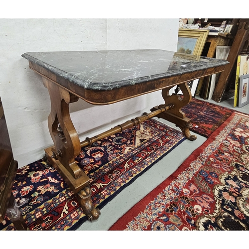 88 - Victorian polished Walnut Centre Table, with lyre shaped supports, turned stretcher and a later dark... 